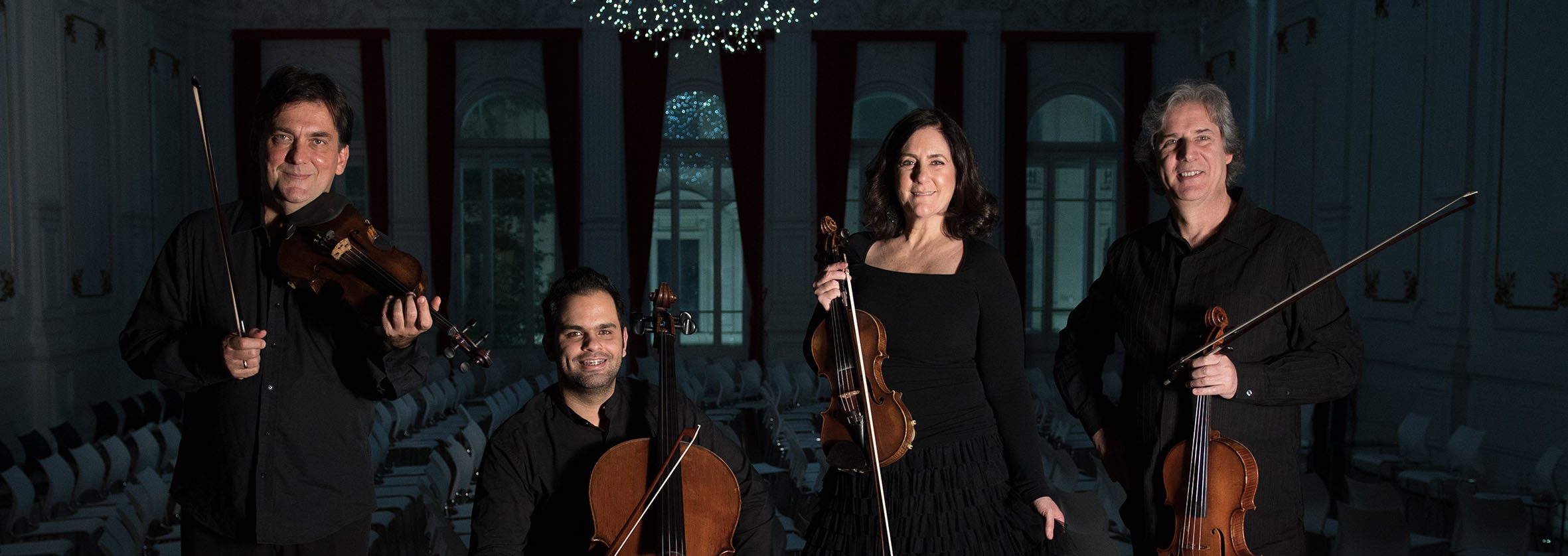 Site Quarteto Foto dos quatro integrantes do Quarteto de Cordas da Cidade de São Paulo